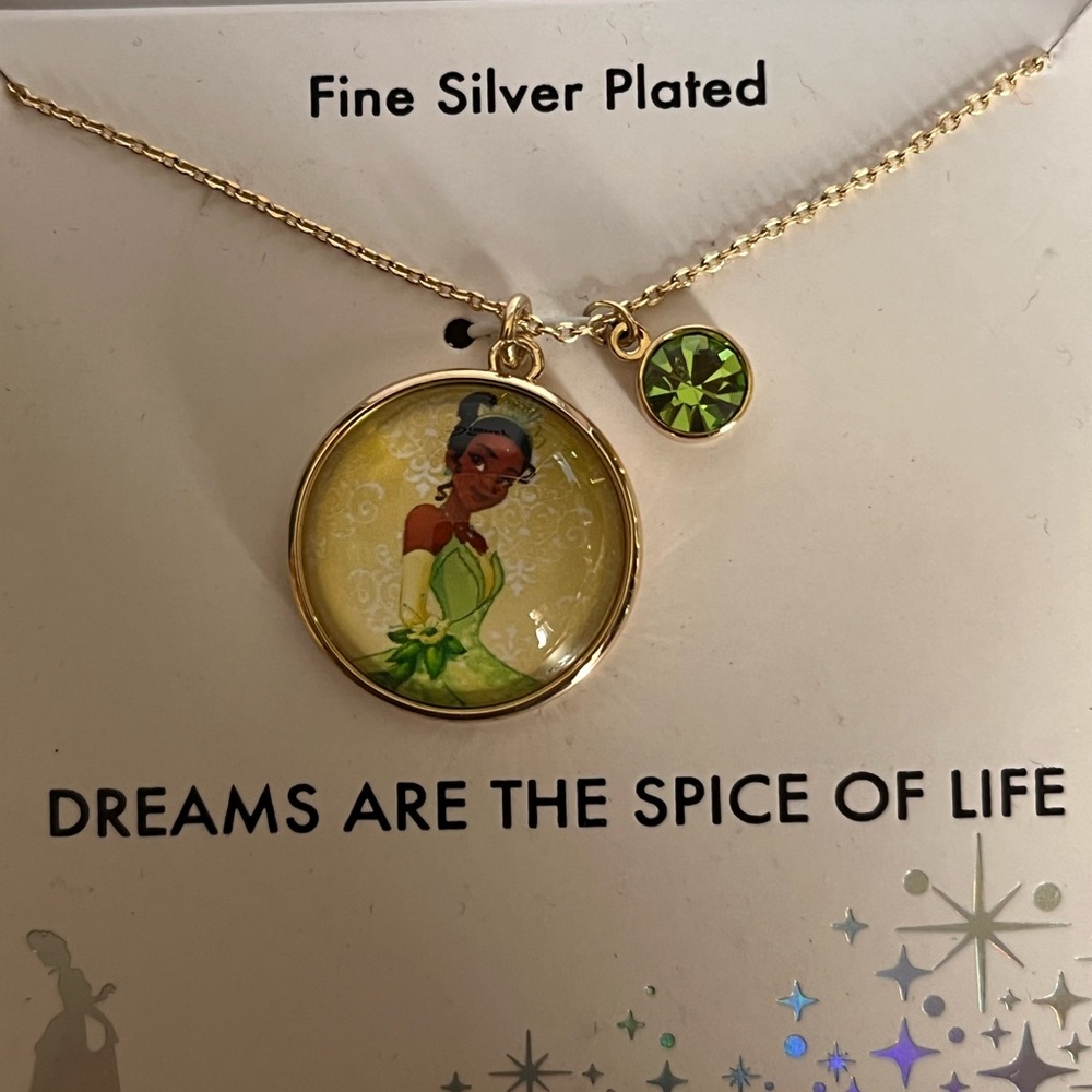 Tiana Necklace with a sparkly green charm